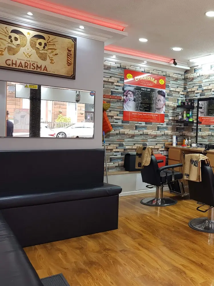 Three barber chairs inside Charisma DapperHouse